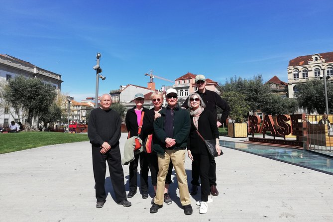 Authentic Oporto Walking Tour with Wine Tasting - Clérigos Tower brings the hills into view