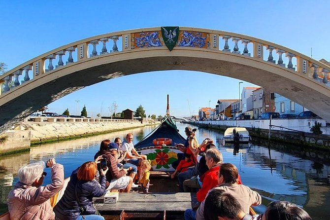 Aveiro and Costa Nova: Private Tour with Moliceiro Cruise Half Day - Leaving Porto with a private guide