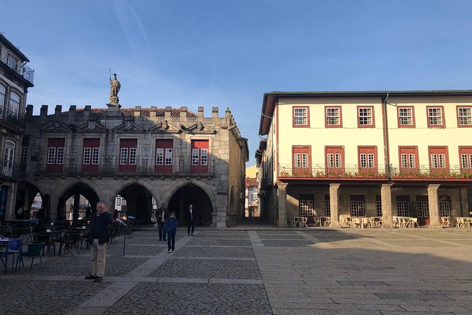 Braga & Guimarães Small Group Tour: Lunch & All Tickets Included - Walking Guimarães old town after the monuments