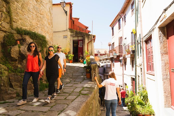 Experience Porto's Charm: 3-Hour Guided Walking Tour - Santa Clara Church, tiled façades, and a café pause