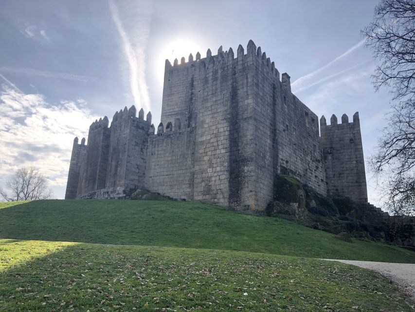 From Porto: Braga & Guimarães with Lunch Small Group Tour - Guimarães Castle and the birth of Portugal