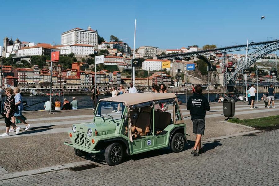 Porto and Foz: Private Douro City Tour in an Electric Ford T - Following the Douro past the bridge