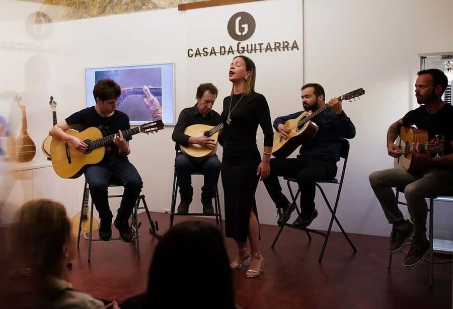 Porto: Authentic Fado Show, Port Wine & Handmade Instruments - Entering Casa da Guitarra near Dom Luís Bridge