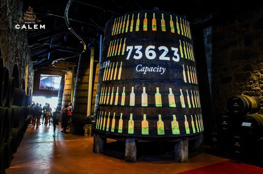 Porto: Cálem Cellar with Chocolate, Cheese, and Wine Tasting - Inside the working Cálem Cellar