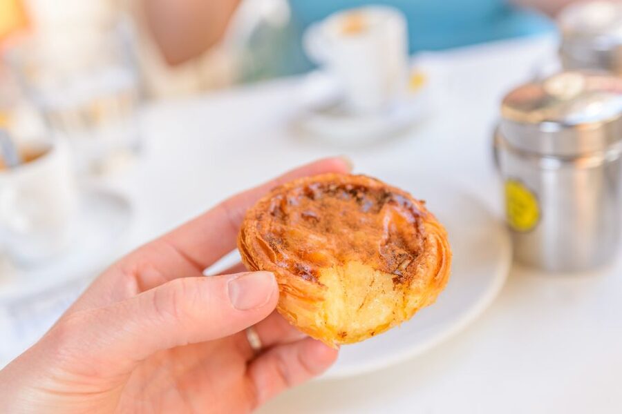 Porto: Delicious Food and Wine Walking Tour - Walking between stops and meeting local guides