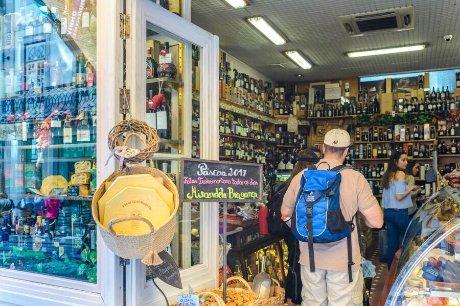 Porto: Delicious Food and Wine Walking Tour - The first bites: bifana, cod cake, and caldo verde