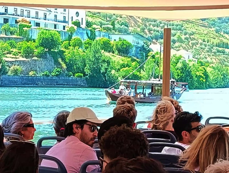 Porto: Douro Valley Tour at 2 Wineries with Lunch and Cruise - Pinhão from the deck of a Rabelo boat