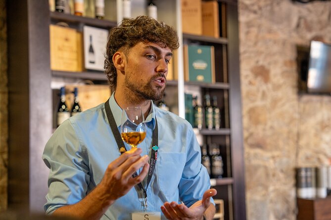 Porto Half-Day Guided Historical Tour with Port Cellar Visit and Tasting - Santa Catarina Street and the old Elite Café