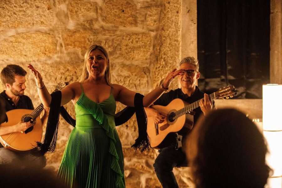 Porto: Live Fado Show with Glass of Port Wine - The sound, mood, and level of audience interaction
