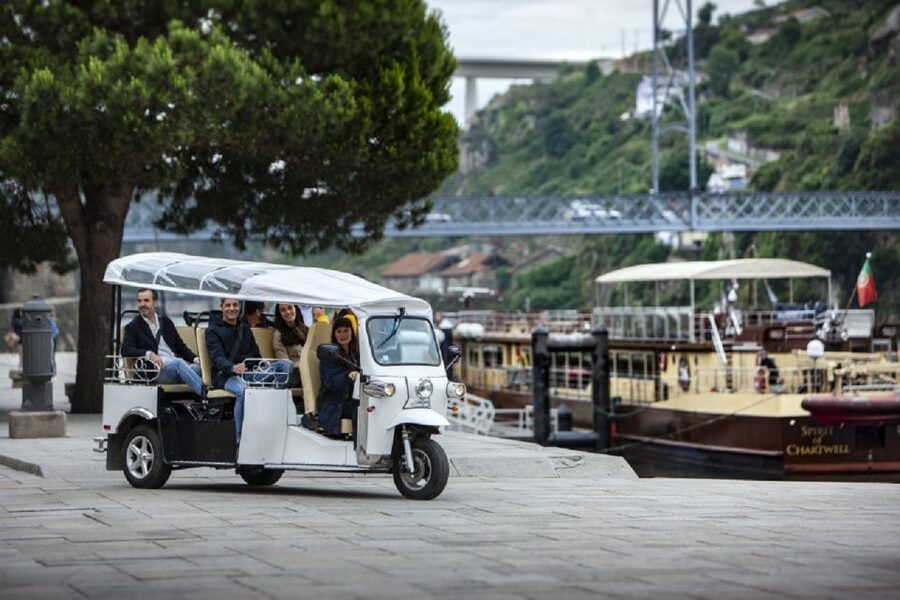 Porto: Private Sightseeing Tour by Electric Tuk Tuk - Palácio da Bolsa and Porto’s trading past