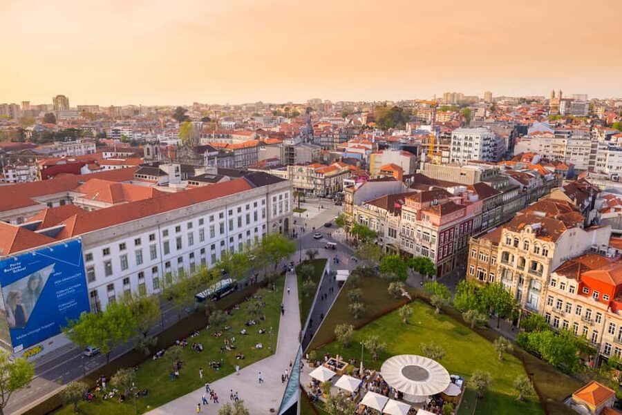 Porto: Private Sunset Walking Tour with Port Wine and Views - The first Port tasting on a rooftop terrace