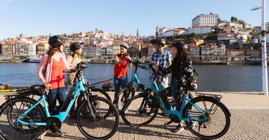 Porto: Riverside Panoramic E-Bike Tour - Ribeira Square: Porto’s riverfront stage