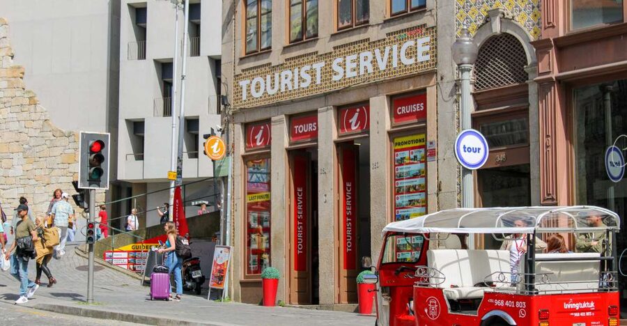 Porto: Tuk-Tuk Tour, Douro River Cruise, and Wine Tasting - Taking the rabelo boat past Porto’s six bridges