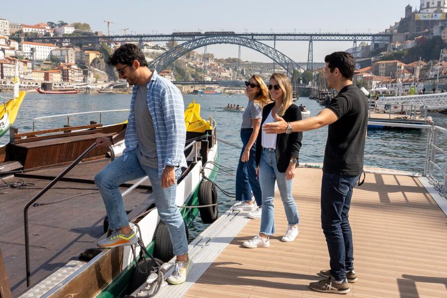 Porto: Walking Tour, Lello Bookshop, Boat and Cable Car - Walking toward Dom Luís I Bridge