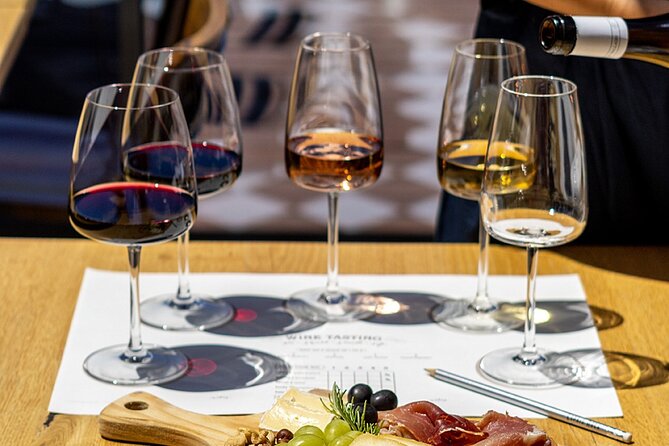 Porto Wine Tasting Experience with Portuguese Tapas Plate - Five Douro wines, then White Port