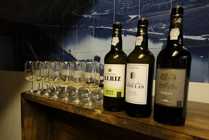 Taste of Porto: The Ultimate Full Meal Portuguese Food Tour - Rua do Carmo and a social spread of petiscos