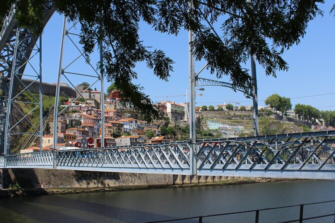 Wine Tasting with Tapas Walking Tour in Porto - Crossing the river and walking through Ribeira